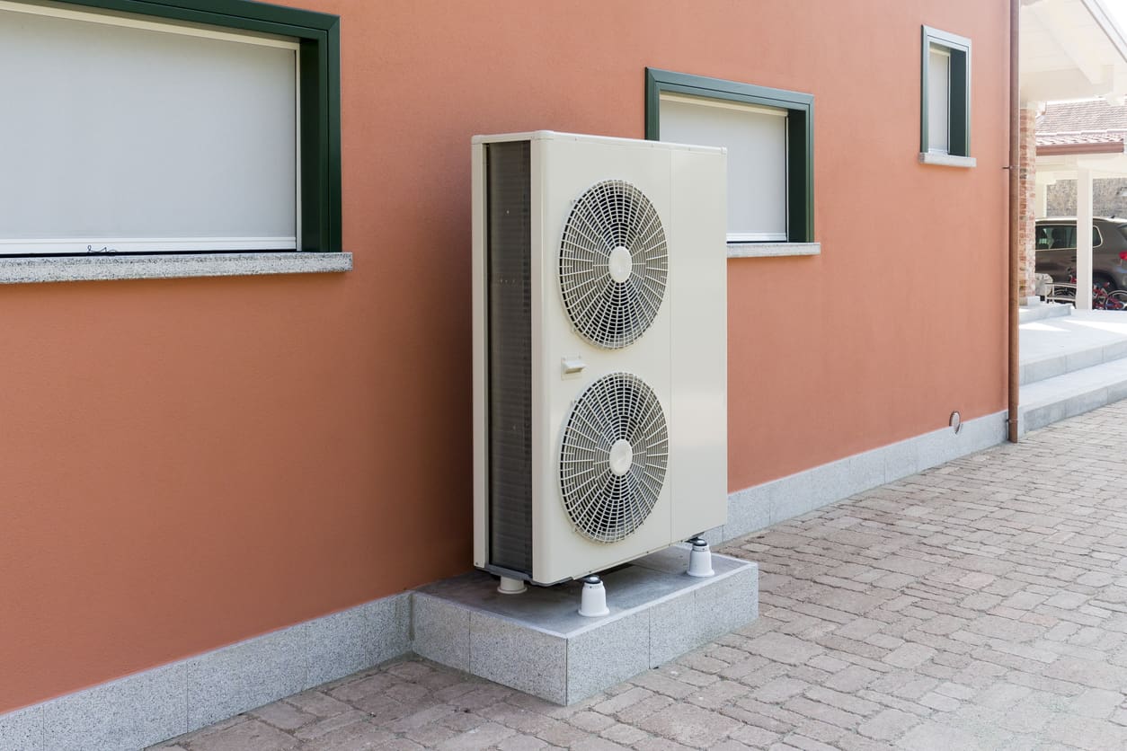 Heat Pump Outside Stucco Home